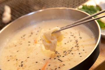South Korea food. Perilla Seed Sujebi (Handpulled Dough Soup)