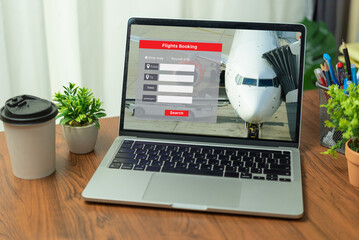 search Online booking plane ticket vacation on laptop. booking flight travel holidays online.
