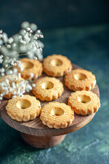 front view sweet cookies on dark background dessert biscuit sugar cake pie sweet break dough tea