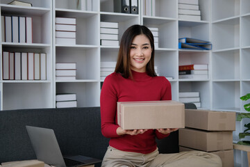 SME entrepreneur Small business entrepreneurs Online selling ideas,Happy Young Asian business owner...