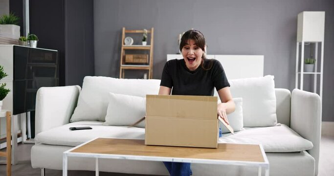 Woman Receiving Parcel Or Delivery Package