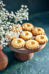 front view sweet cookies on the dark background dessert biscuit sugar cake pie sweet break dough tea