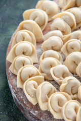 front view tasty little dumplings on dark blue background dough color meat food calories meal food dish