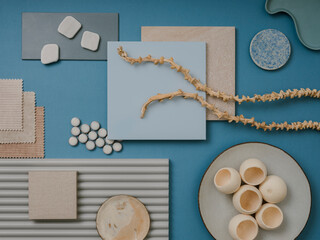 Elegant  flat lay composition in blue, brown and beige color palette with textile and paint samples, lamella panels and tiles. Architect and interior designer moodboard. Top view. Copy space. .
