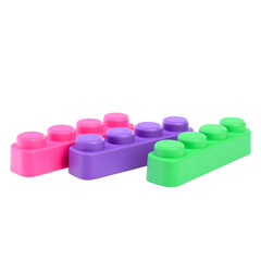 Multi-colored plastic children's construction kit, isolated on a white background. Design and modeling. Development of children's motor skills and thinking. Building different models