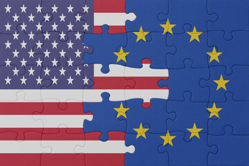 puzzle with the national flag of european union and united states of america. macro