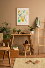 Cozy composition of living room interior with mock up poster frame, plants in flowerpots, wooden bench, round stool, brown wall, books, boho carpet and personal accessories. Home decor. Template.