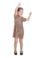 Dancing little girl in golden dress isolated