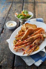 King prawn with rusks served for lunch