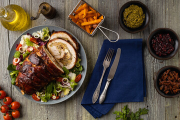 Stuffed turkey breast. Roasted whole, served with fresh vegetables.