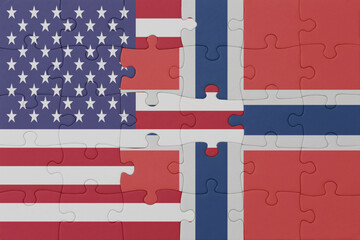 puzzle with the national flag of norway and united states of america. macro