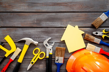 Construction tools set with helmet and hammer. House improvement concept