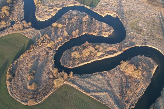 Beautiful meanders of the Gwda River in Poland seen from a drone