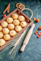 front view tasty biscuits inside wooden box on dark background cookie biscuit pie nut tea cake color sweet