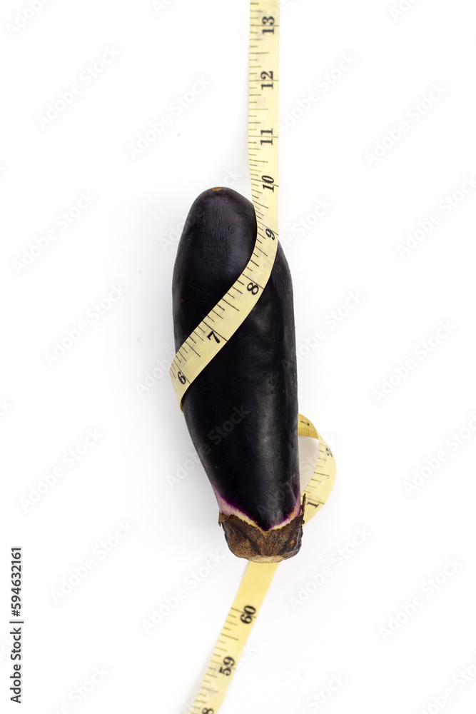 Wall mural Eggplant with measuring tape on white background.