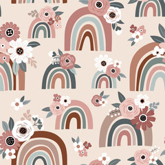 Seamless vector pattern with cute hand drawn rainbows and vintage flowers. Earthy toned boho rainbows. Perfect for textile, wallpaper or nursery print design. © MirabellePrint