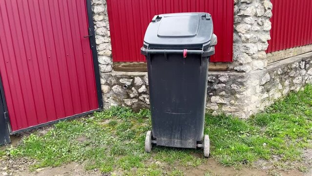 Garbage container near the house