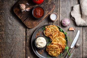 Potato pancakes with garlic sauce. Draniki