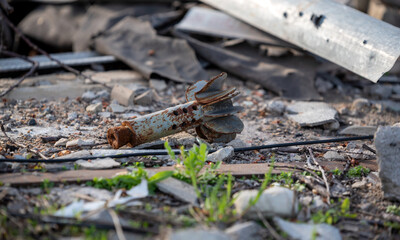 tail of an exploding mine on a city street in Ukraine