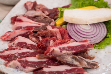 Juicy Beef for Korean Barbeque with fresh vegetables