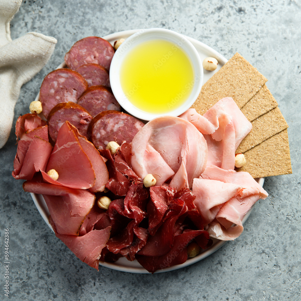 Sticker meat platter with nuts and bread