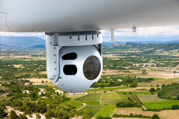 Camera sensor pods under an unmanned aerial surveillance drone aircraft. - 594642374