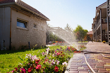 Automatic watering system on the lawn. watering heads and pipes 