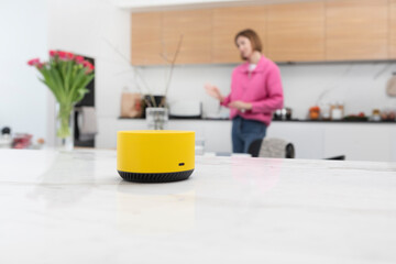 Close up photo of smart speaker able to manage home in wireless way
