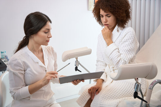 Young Woman At A Gynecologist Appointment In Clinic