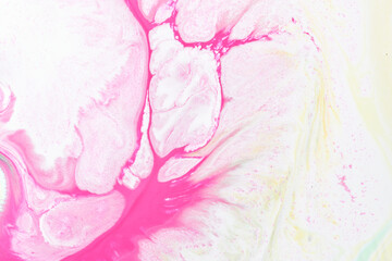 Abstract background liquid art, paint stains and blots, pink alcohol ink, multi-colored marble texture