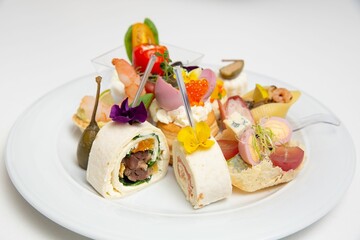 Freshly prepared appetizer is showcased on a white plate