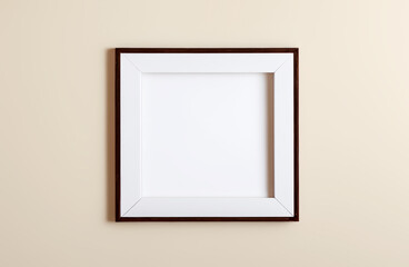 Square shaped blank picture frame on wall