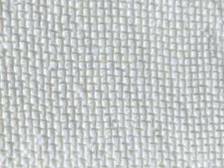 Abstract background of fresh cheese with cheesecloth pattern