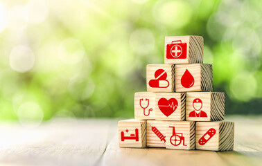 Lay out wooden blocks with icons of medical health. health insurance for your health concept....