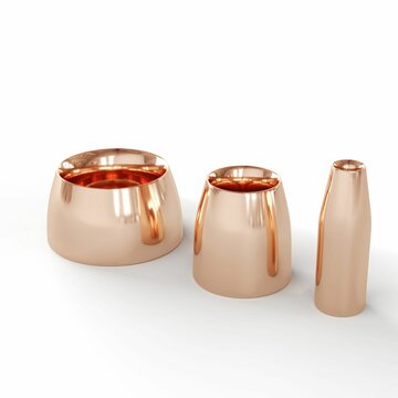 two copper vases sitting next to each other on a white surface
