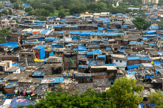 Aerial view of a cluster of slums in a neighbourhood in the suburb of Kandivali in the city of Mumbai.