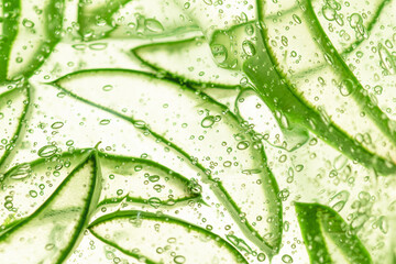background of aloe slices in cosmetic gel
