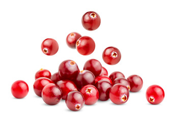 pile with falling cranberries on a white isolated background