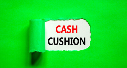 Cash cushion symbol. Concept words Cash cushion on beautiful white paper. Beautiful green table green background. Business and Cash cushion concept. Copy space.