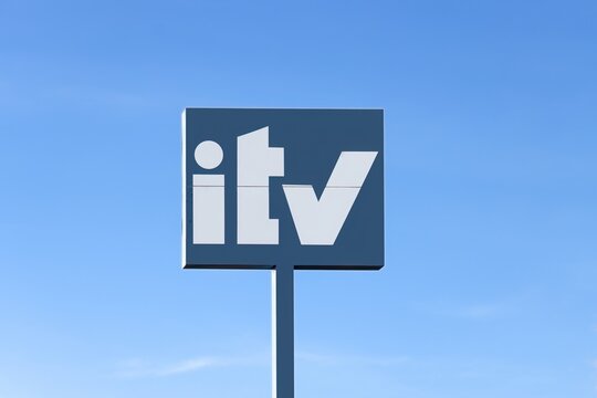 Teruel, Spain, 03-12-2023, Sign indicating the technical inspection of vehicles, ITV, photo isolated on a blue sky