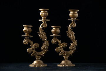 Fototapeta na wymiar front view elegant candlestick on dark floor gold lamp lighting fire flame