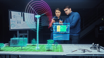 Renewable Energy Engineers Design 3D Wind Turbine Park Using Augmented Reality Hologram and Smartphone. Specialists Use Virtual Reality App to Work on Green Energy Environmental Power Production
