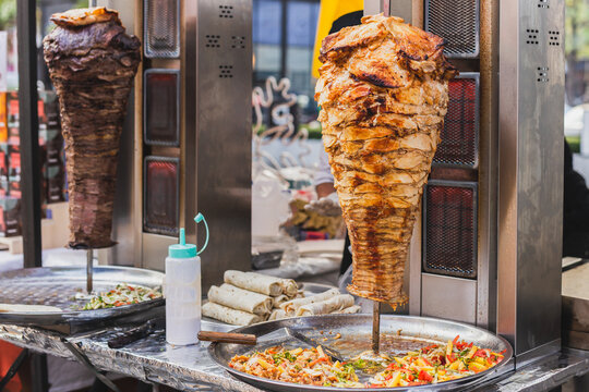 Traditional turkish food chicken doner and beef doner kebab on street vedor.