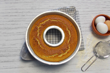 Homemade donut with coconut with eggs and flour, tupic Italian dessert
