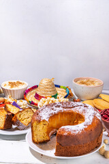 Traditional Festa Junina Summer Festival Carnival Food. Traditional Brazilian Festa Junina dishes and snacks - popcorn, peanuts, corn cake and cookie, pacoca, with holiday decorations and accessories