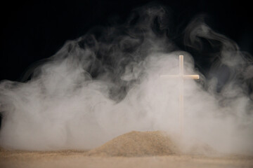 front view of little grave with smoke on dark background israel war palestine