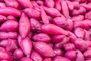 Pickled red onions close up. Red onions marinated in vinegar. Speciality. Red onions background. Organic food