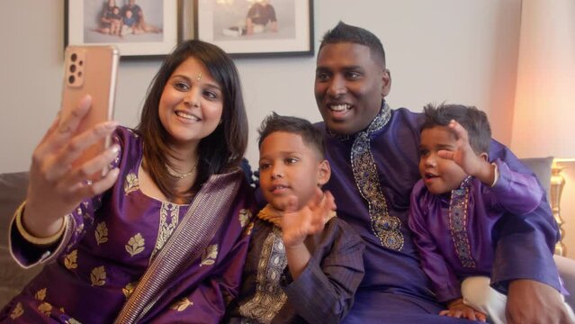 MS Parents and sons (2-3, 6-7) having video call on Diwali