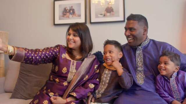 MS Parents and sons (2-3, 6-7) having video call on Diwali
