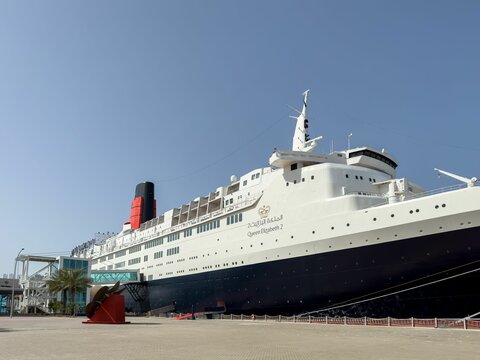 Luxury ocean liner Queen Elizabeth 2 docked in the harbor.